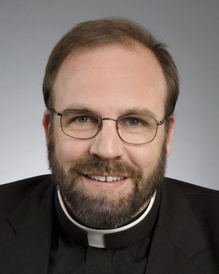 Fader Charles Pope